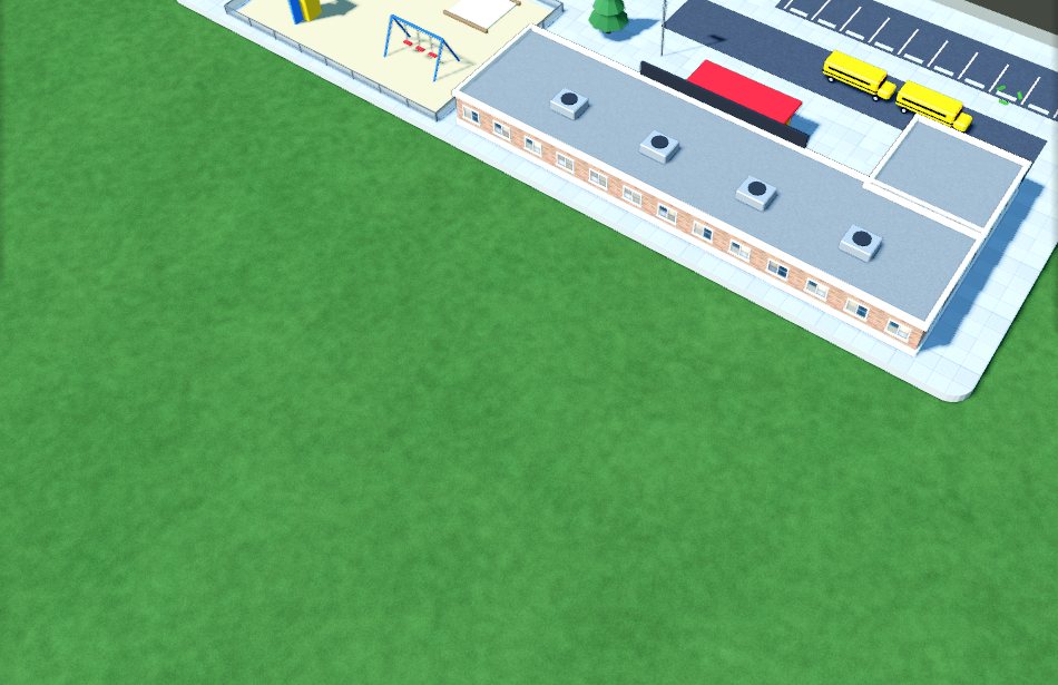 An elementary school with school buses